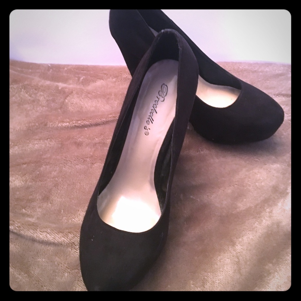 Breckelle’s black suede slip on platform wedges